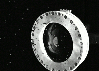 OSIRIS-REx collected too much asteroid material and now some is floating away
