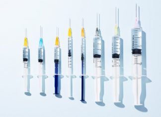 Treatment and Vaccine Trials are Halted, US Cases Rise, and More Coronavirus News