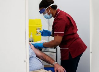 The First Shots, Grim Milestones, and More Coronavirus News