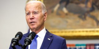 The Download: Biden’s executive order, and calling out AI harms